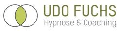 Logo mit zwei Kreisen, Text "Udo Fuchs Hypnose & Coaching" in Grün und Grau.