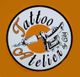Logo mit Tätowiermaschine und Text: "Tattoo Atelier by Coby", orange und weißer Hintergrund.