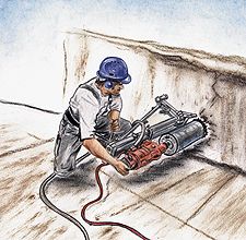 Ein Arbeiter mit Schutzhelm bedient ein mechanisches Gerät an einer Wand.
