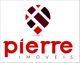 Logotipo "Pierre Imóveis" com design geométrico em vermelho e preto.
