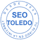 Sello azul con el texto "SEO TOLEDO" y "Desde 2009, tu aliado en la Internet".