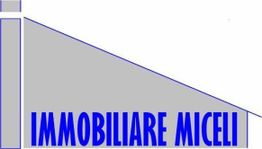 Logo di un'agenzia immobiliare con scritta "IMMOBILIARE MICELI" in blu su sfondo grigio.