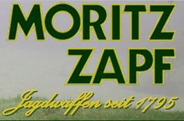 Text: "MORITZ ZAPF - Jagdwaffen seit 1795" in grüner und gelber Schrift auf grauem Hintergrund.