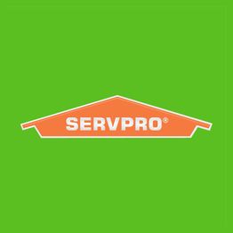 SERVPRO logo on a green background, featuring an orange roof-like shape.