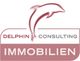 Logo mit Delphin, Text "Delphin Consulting Immobilien" in rosa und weißem Quadrat.