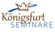 „Königsfurt Seminare“-Logo mit Krone und blauer Linie.