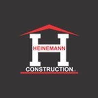 Logo of Heinemann Construction with a stylized "H" and roof design on a dark background.