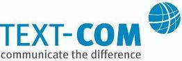 Logo mit blauem Text "TEXT-COM" und Slogan "communicate the difference", daneben Globus-Symbol.
