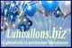 Blau-silberne Luftballons vor blauem Himmel, Text: "Luftballons.biz – Luftballons in schönsten Variationen".