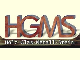 Logo mit den Buchstaben HGMS und dem Text "Holz· Glas· Metall· Stein" darunter.