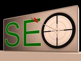 SEO text with a target symbol and an arrow hitting the bullseye.
