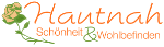 Schriftzug "Hautnah Schönheit & Wohlbefinden" mit rosa Blume.