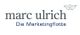 Logo mit Text "marc ulrich - Die Marketingflotte" und einem Papierboot-Symbol.
