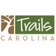 Logo with "Trails Carolina" text and abstract tree design.