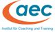 Logo des Instituts für Coaching und Training mit „aec“ in Blau und einem orangefarbenen Bogen.