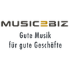 Logo mit der Aufschrift "MUSIC BIZ" in Schwarz und Gelb, darunter "Guido Music" und "Experto Contenido".