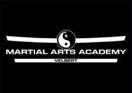 Logo der Martial Arts Academy Velbert, schwarz-weiß mit Yin-Yang-Symbol.