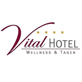 Logo des Vital Hotels mit vier Sternen und Text: "Wellness & Tagen".