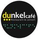 Logo "dunkelcafé" mit Blindenschrift, Text: "Restaurant & Lernort", schwarzer Hintergrund.