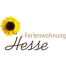 Logo mit Sonnenblume und Text: "Ferienwohnung Hesse".