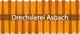 Orange-weiß gestreiftes Logo mit dem Text "Drechslerei Asbach" in der Mitte.