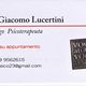 Biglietto da visita di psicologo con dettagli di contatto e motto latino.