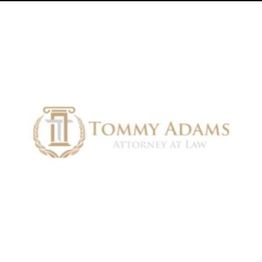 Gavel emblem with text: Tommy Adams, Attorney at Law.