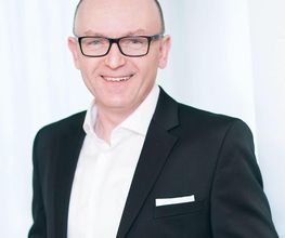 AXA Generalvertretung Norbert Tomczyk Logo