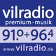 "Logo von Vilradio: premium musik, Frequenzen 91.0+96.4, Webseite www.vilradio.de."