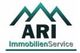 Logo mit grünen Bergen und Text: "ARI ImmobilienService".