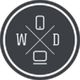 Logo with "W" and "D," a phone, and a computer in a circular design on a dark background.