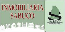 Letrero de "Inmobiliaria Sabuco" con ilustración de edificios y logo de casa.