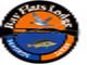 Blurry logo for Bay Flats Lodge with bird and fish on orange and blue background.