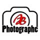 Logo d'un appareil photo avec "AB" en rouge et le mot "Photographe" en dessous.