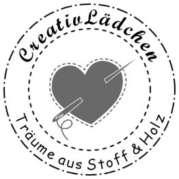 Logo: Herz mit Nadel, Text: "Creativ Lädchen - Träume aus Stoff & Holz".