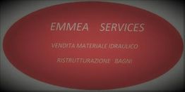 Segnaletica ovale rossa con testo: "EMMEA SERVICES, materiale idraulico, ristrutturazione bagni".