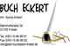 Geschäftskarte von Buch Eckert mit Adresse und Kontaktdaten, daneben Feder, Tinte und Brille.