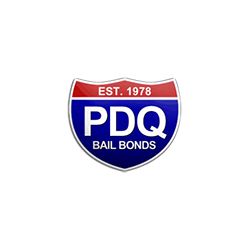 Shield-shaped logo for PDQ Bail Bonds, established in 1978, with red, blue, and white colors.