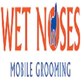 Logo of Wet Noses Mobile Grooming with an orange and blue dog silhouette.
