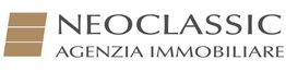 Logo Neoclassic Agenzia Immobiliare con tre barre marroni verticali a sinistra del testo.