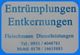 Texttafel: "Entrümpelungen, Entkernungen, Fleischmann Dienstleistungen", mit Kontaktinfos.