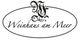 Ovales Logo mit floraler Verzierung, Text: "Weinhaus am Meer".