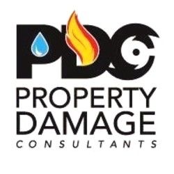 Logo for Property Damage Consultants with water, fire, and saw symbols integrated into "PDC".