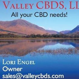 Valley CBDs, LLC ad with mountain and lake scene. Contact: sales@valleycbds.com.