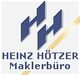Logo mit blauem Muster und Text: "Heinz Hötzer Maklerbüro".