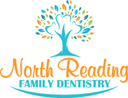 Tree logo for North Reading Family Dentistry with colorful leaves and stylized text.