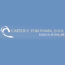 Carter S. Yokoyama, D.D.S. logo with wave design, Kailua-Kona, HI on a blue background.