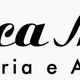 Logo di "Amica Moda" con testo "Pelletteria e Accessori" in caratteri eleganti.