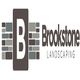 Logo of Brookstone Landscaping with a stylized 'B' and brick pattern design.