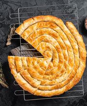 Balkan Bäckerei & Grill PRIZRENI Burek, Pizza Logo
